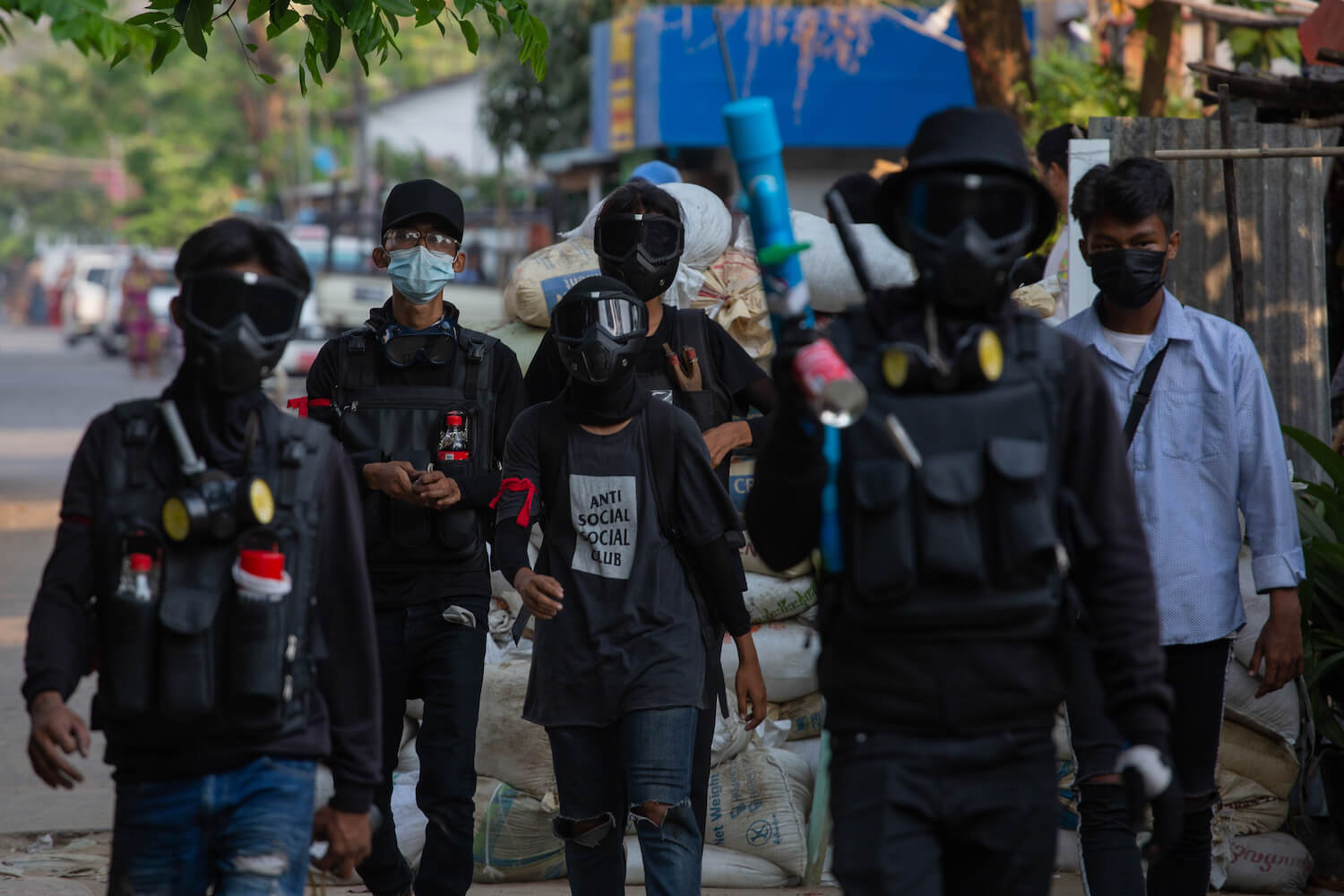 Young members of a neighbourhood 'defence team' in Thaketa Township